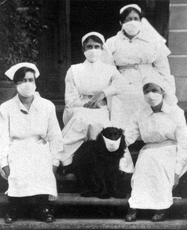 1918 nurses with dog and masks